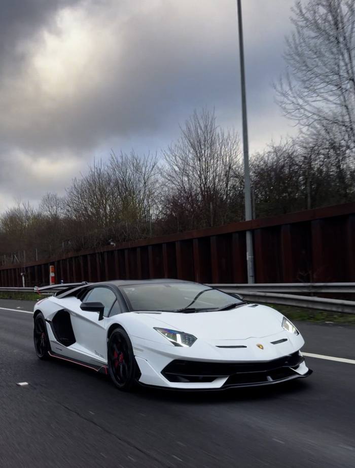White Lamborghini SVJ on a motorway
